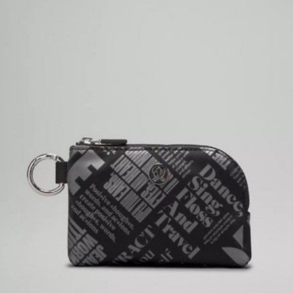 lululemon athletica Handbags - Lululemon Clippable Card Pouch in Manifesto Print” BRAND NEW